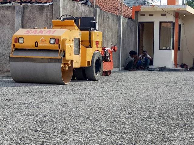 proses-pengaspalan-jalan-hotmix